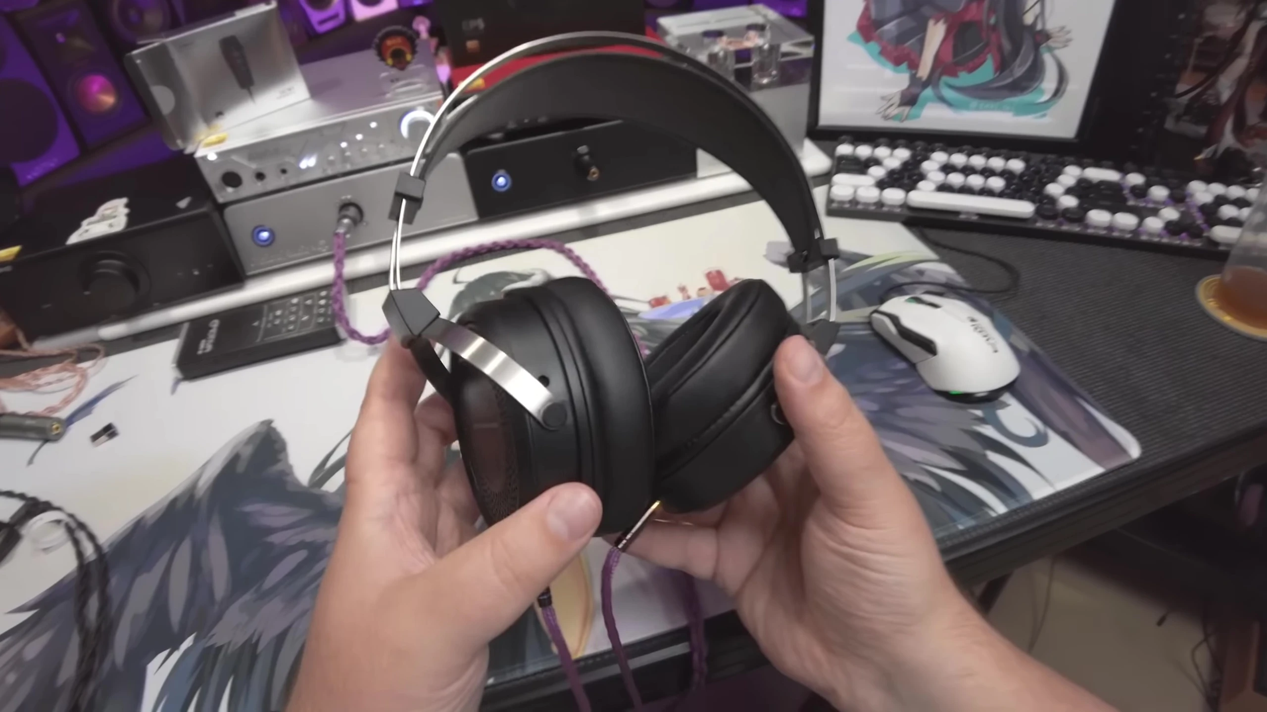 Close-up of the Simgot EP5 headphones, highlighting the black design and venting.