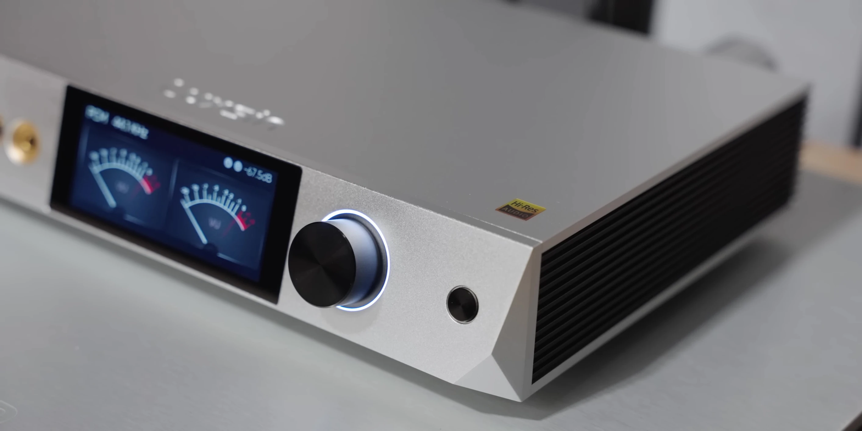The reviewer giving a thumbs-up while looking at the amplifier.