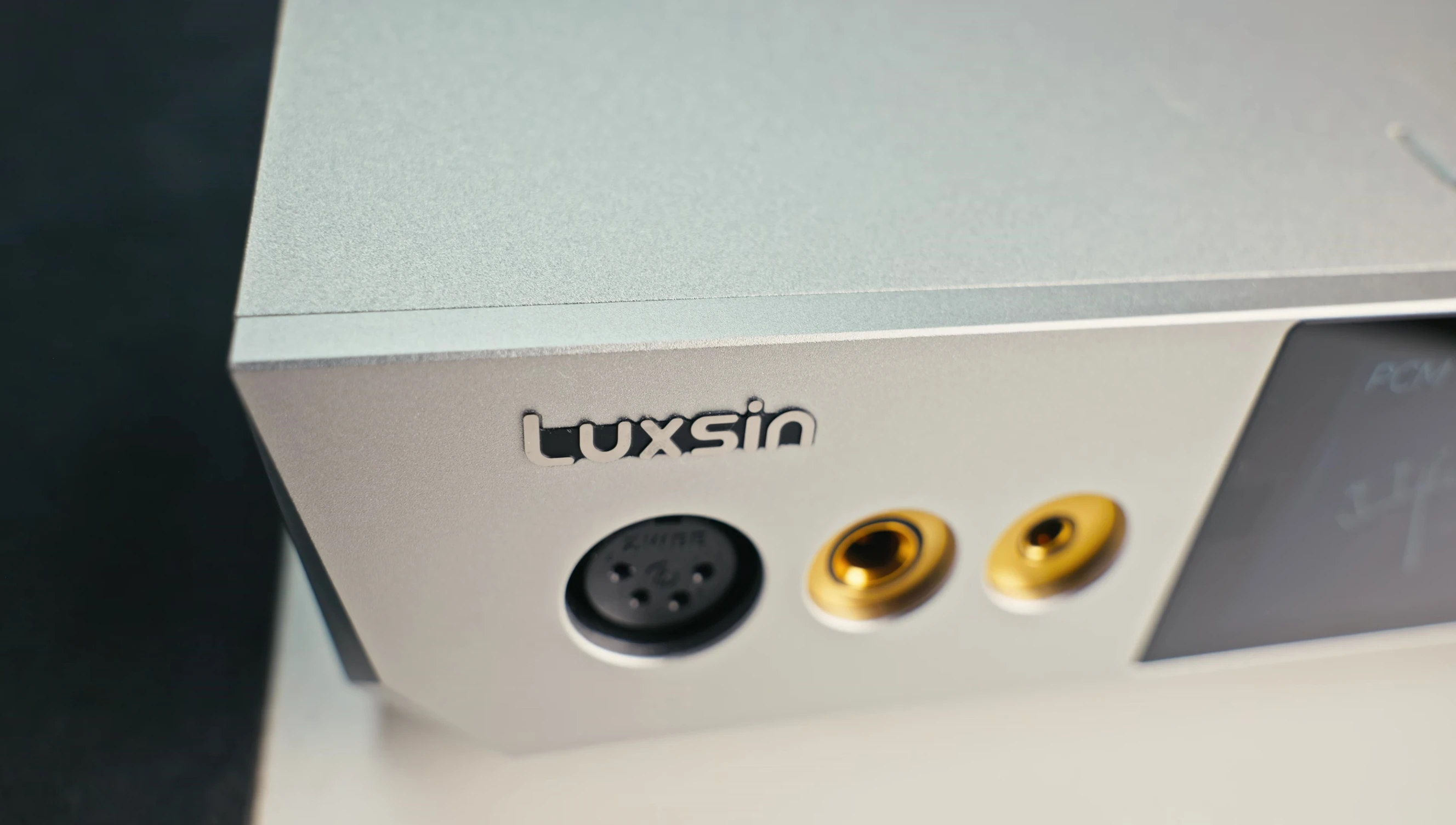 Detailed shot of the X9's headphone output connections.