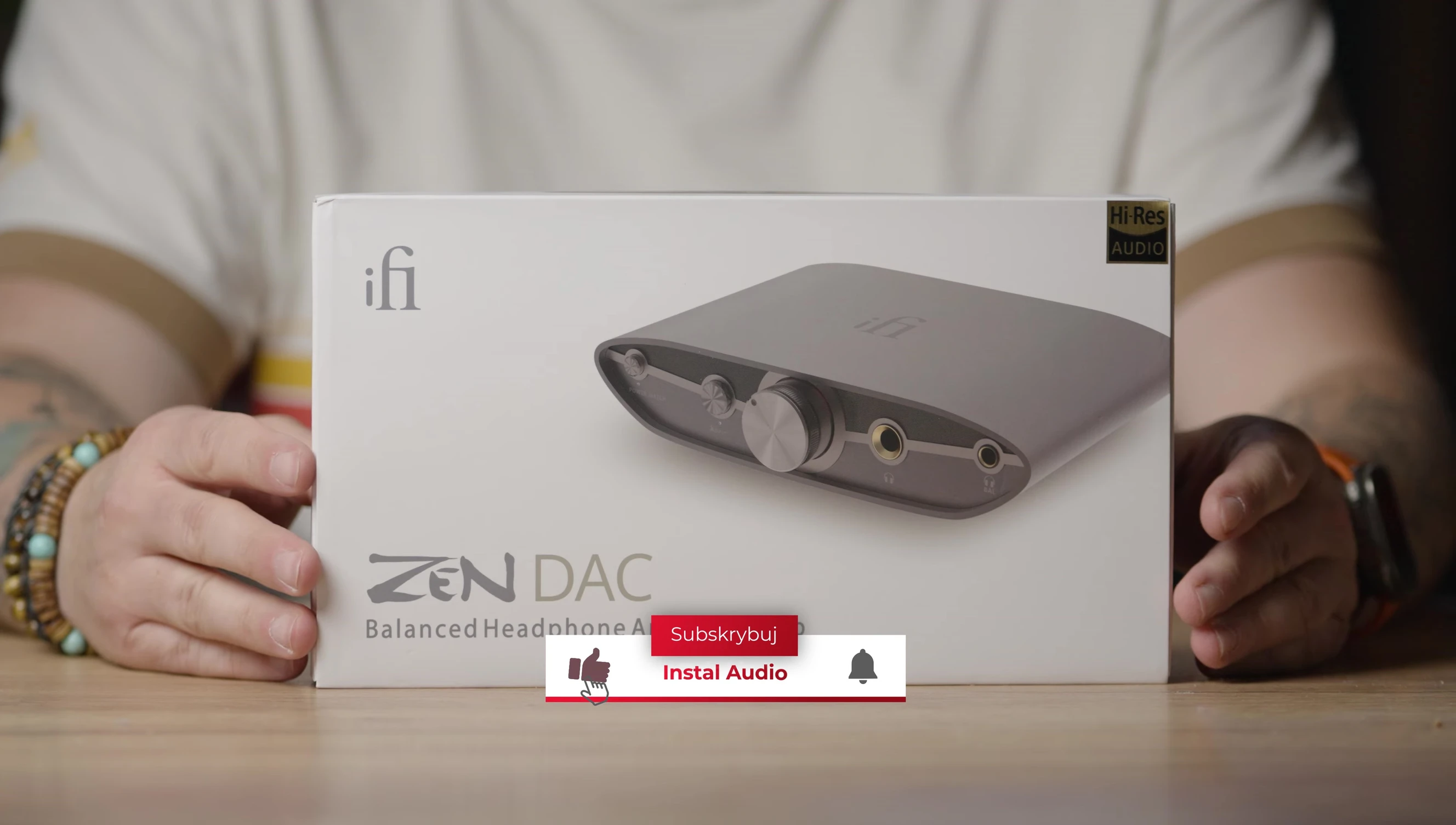Close-up of the iFi ZEN DAC 3 on a desk