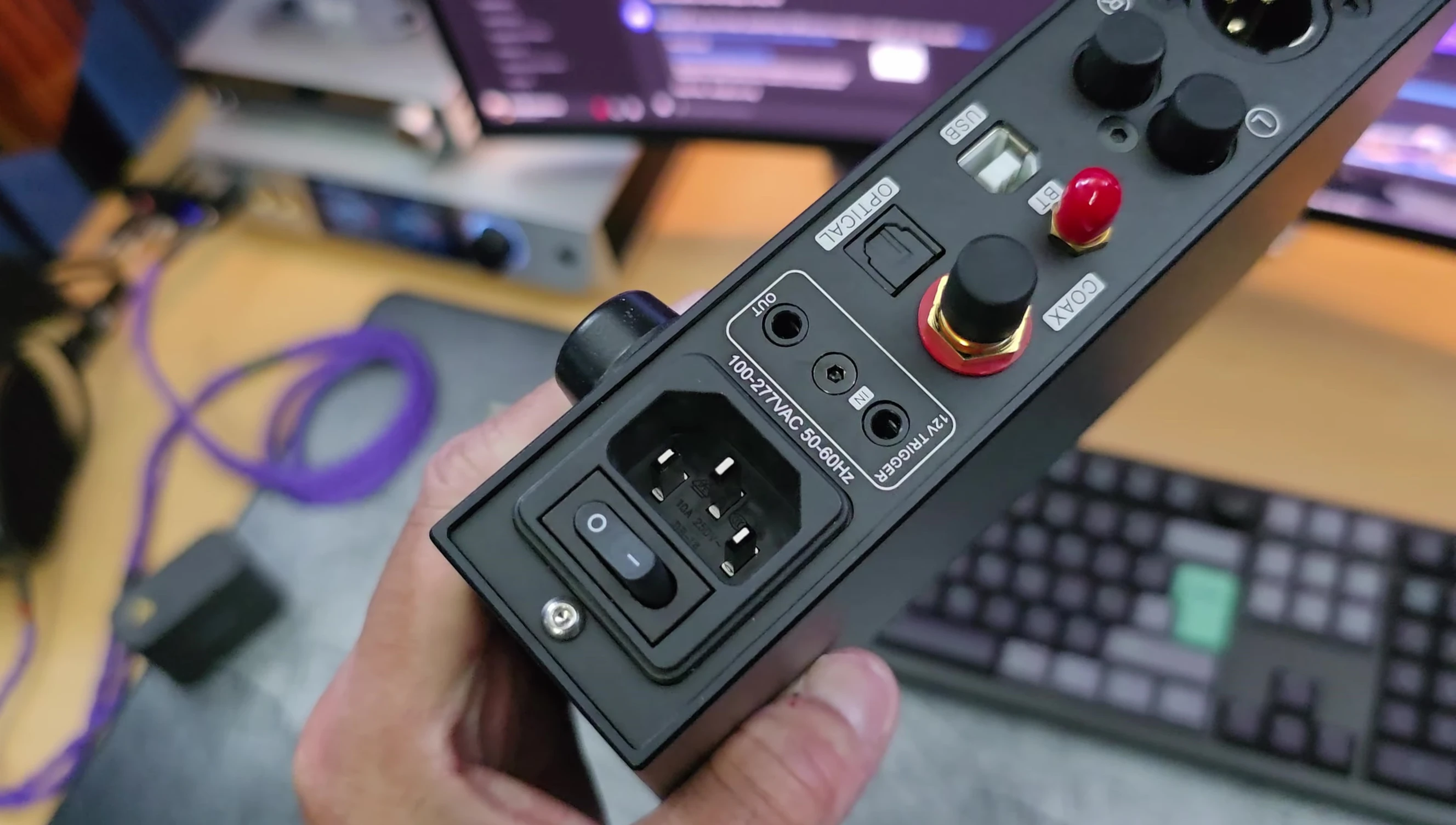 The rear panel of the DX5 II showing its various inputs and outputs.