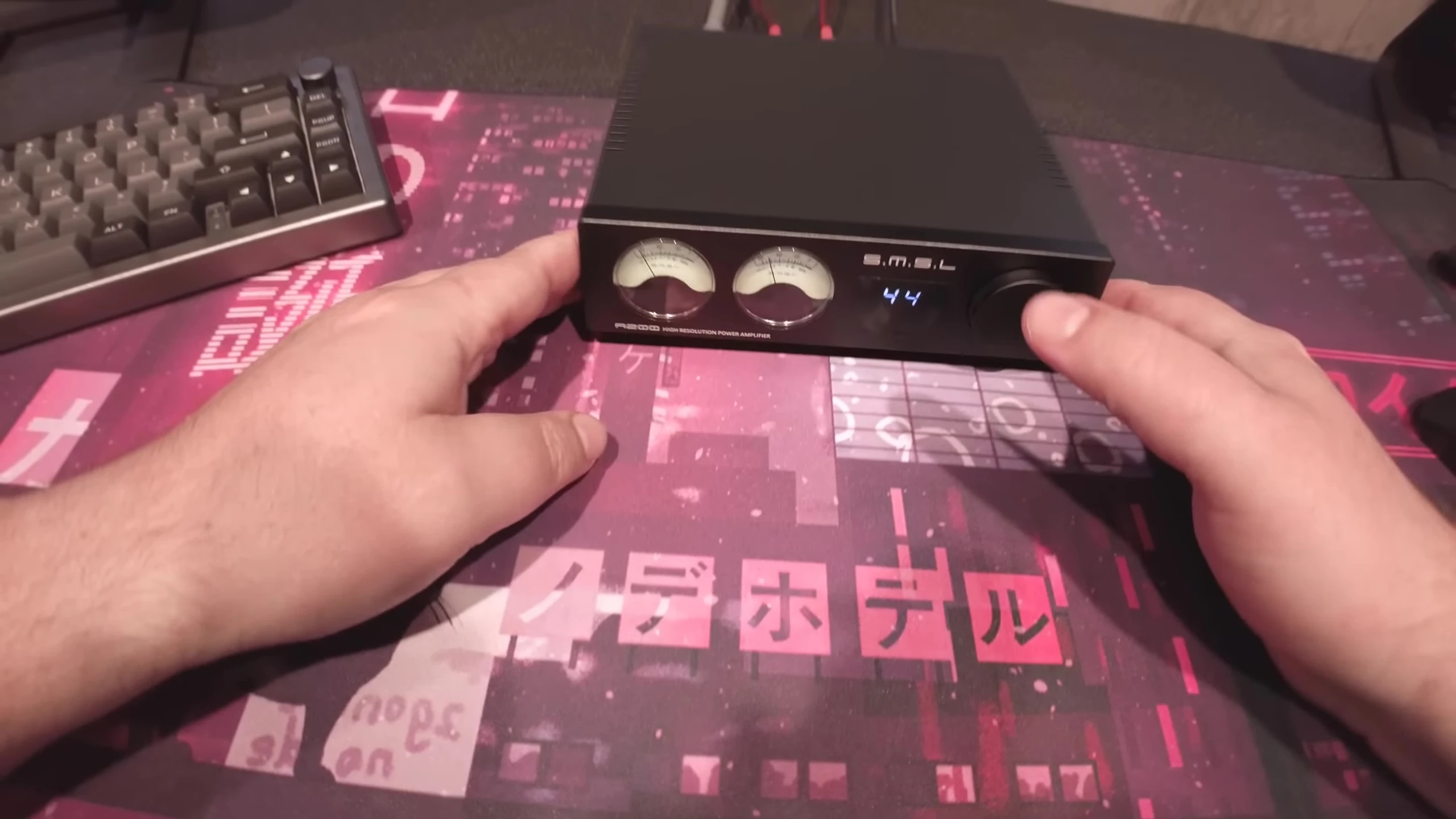 The SMSL A200 amplifier playing music with the Micah RB42 speakers.