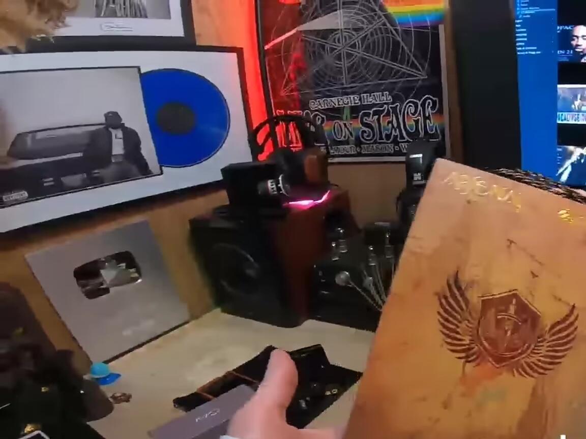The Flippers Aegis earphones displayed next to the packaging.