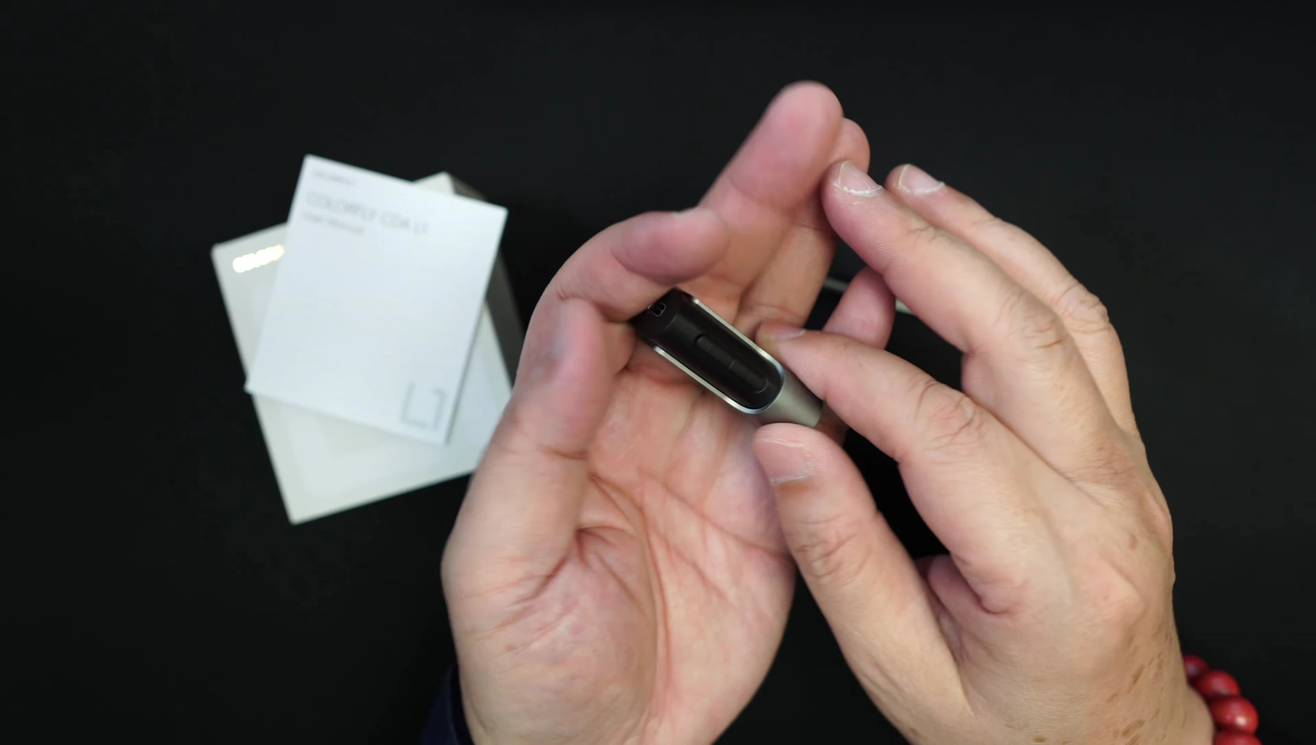 Image emphasizing the compact and lightweight nature of the L1