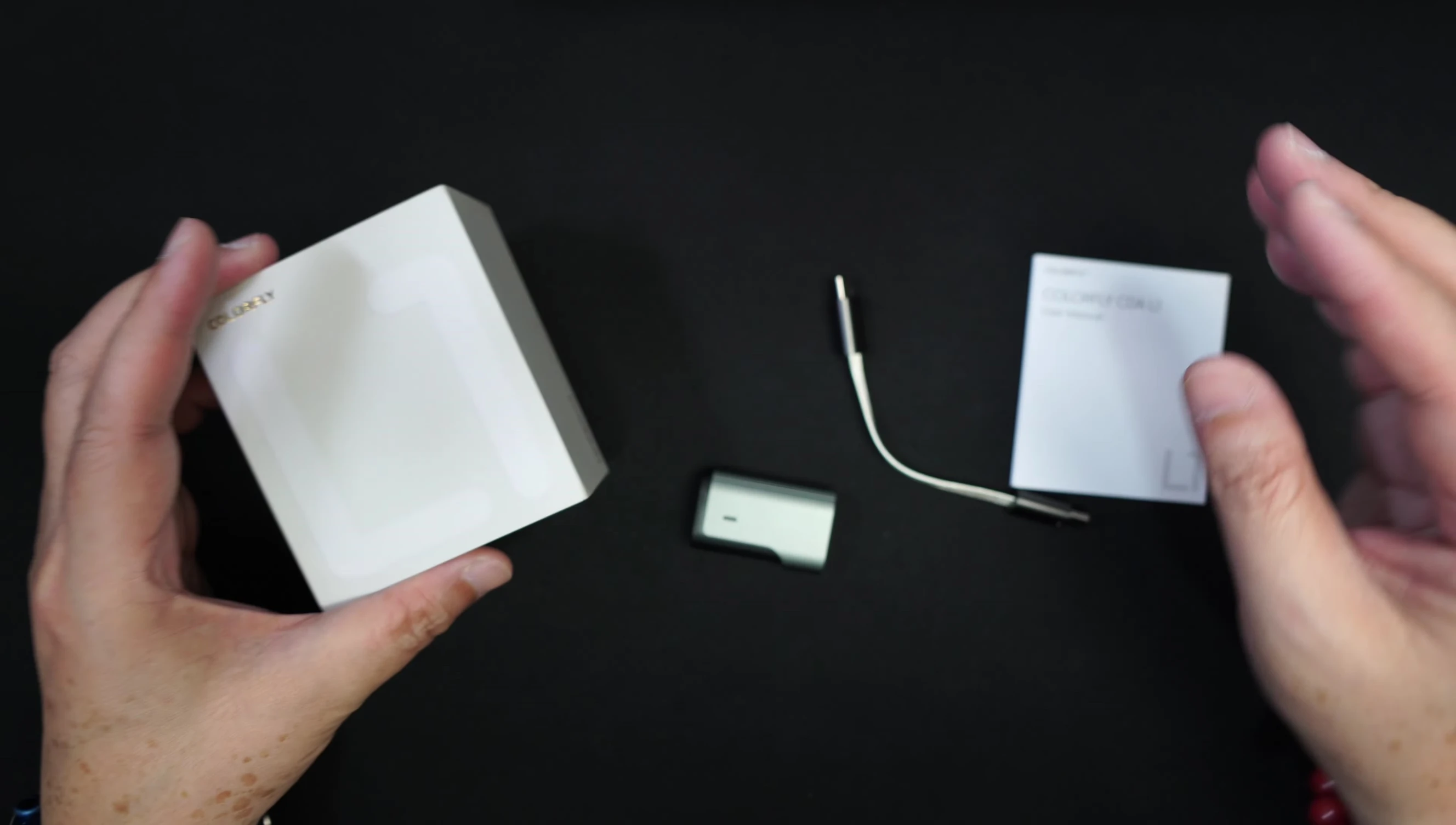 User manual and USB-C cable included with the L1