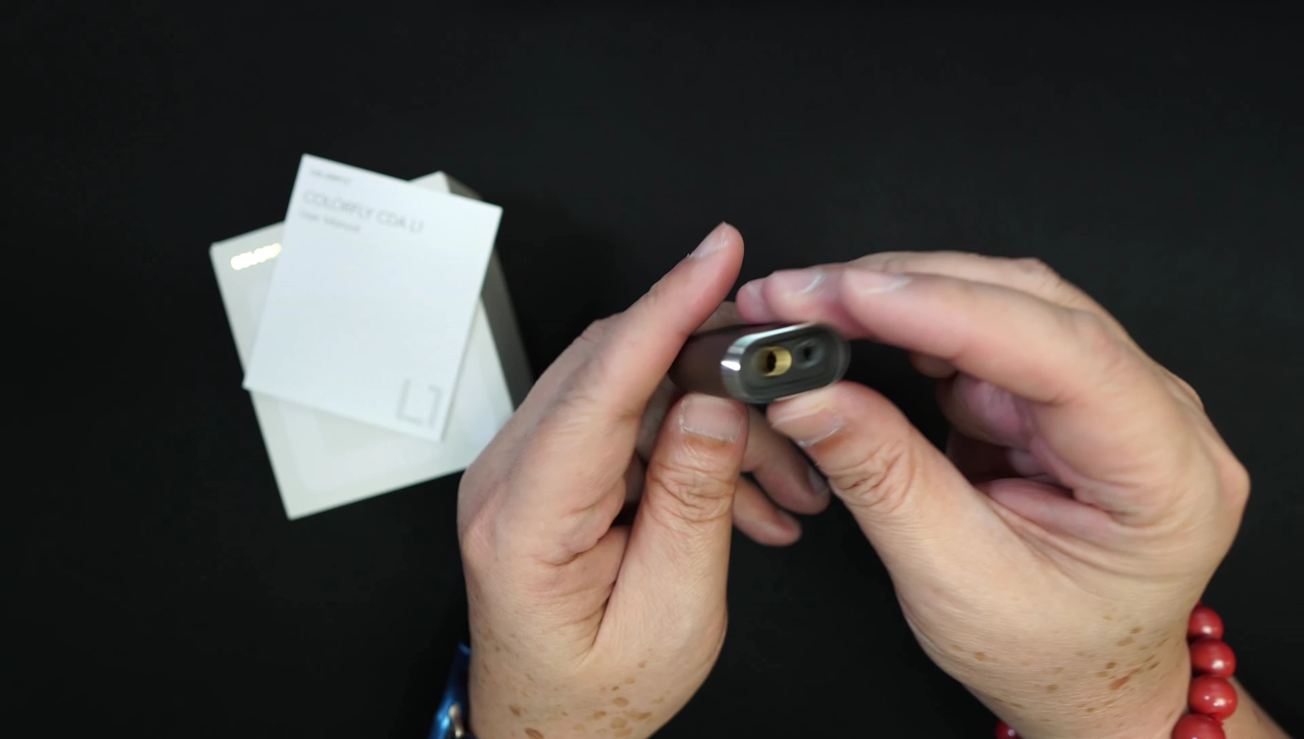 Close-up showcasing the 4.4mm balanced and 3.5mm single-ended outputs