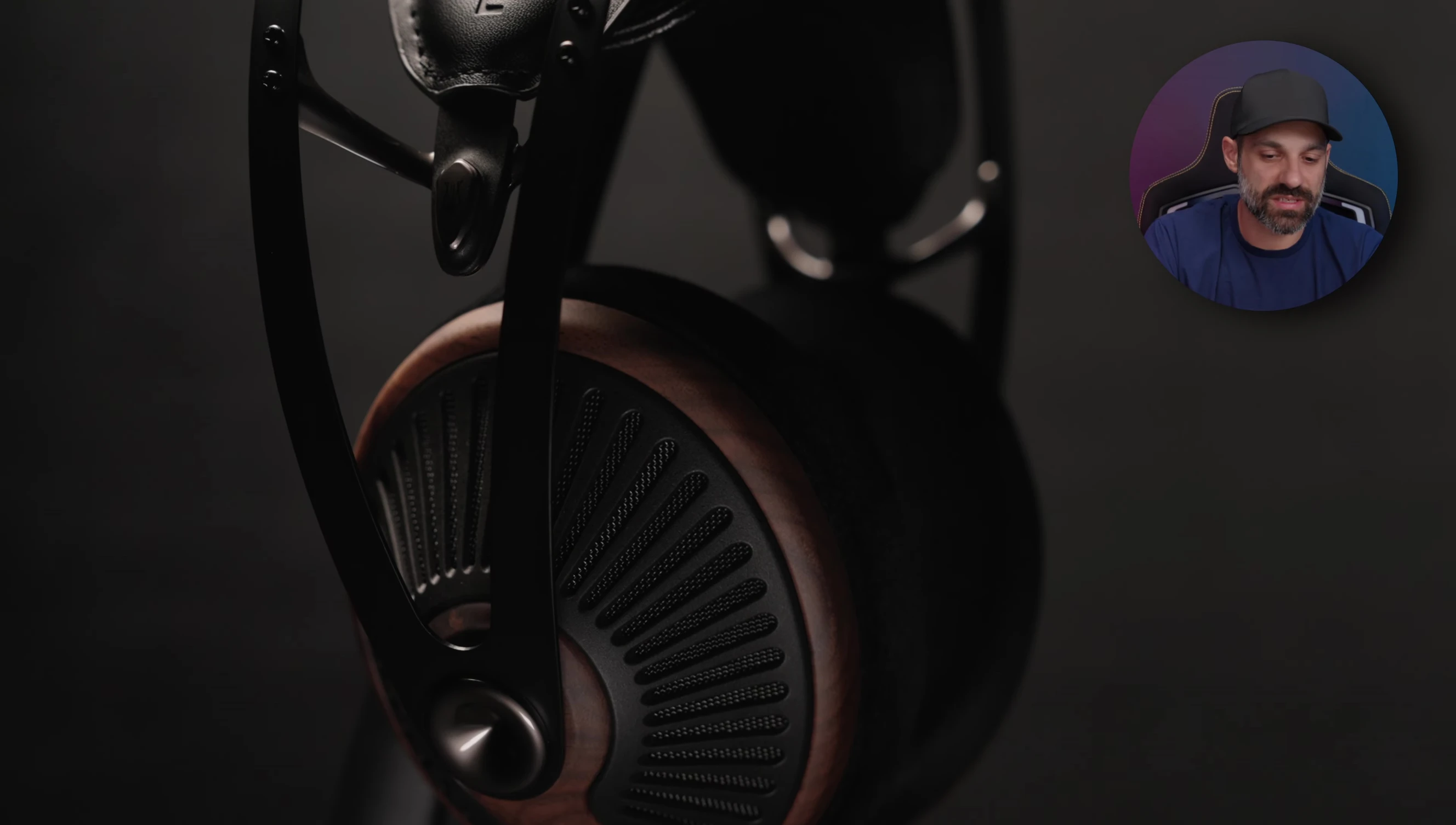 Meze 105 Silva earcup showing the walnut wood and grill design